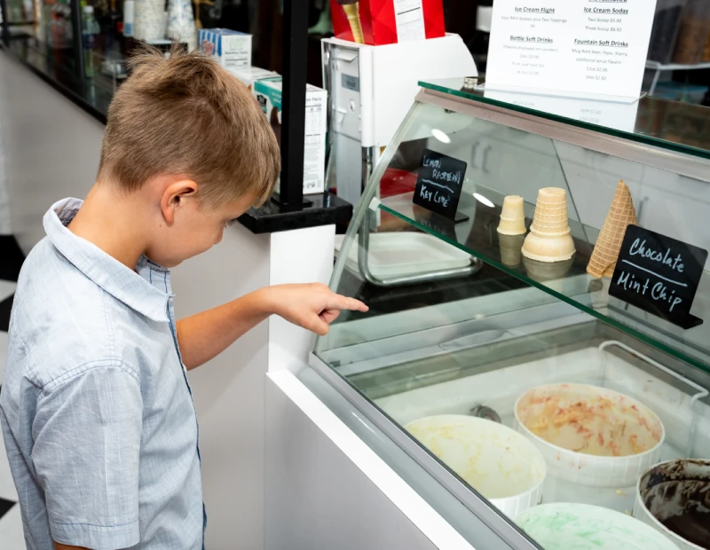 Choosing a flavor at the case