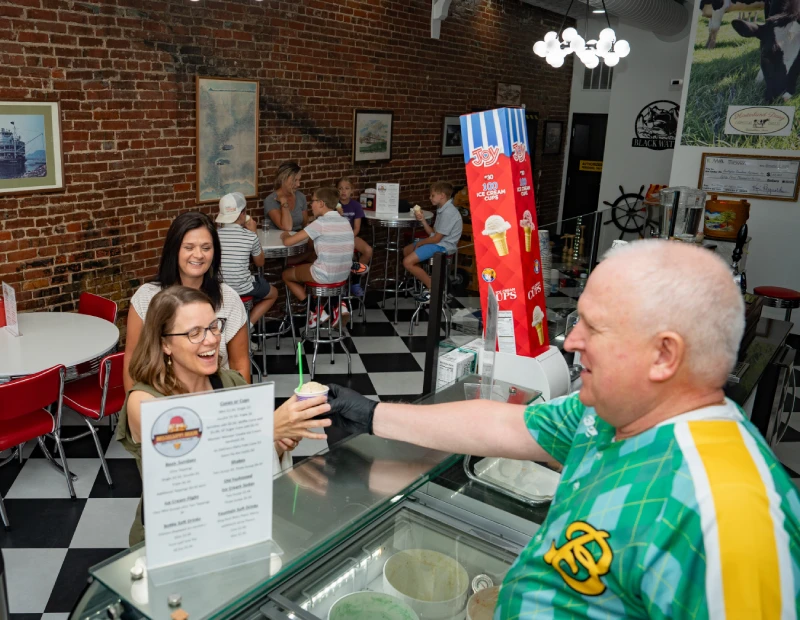 Serving a cone at the counter